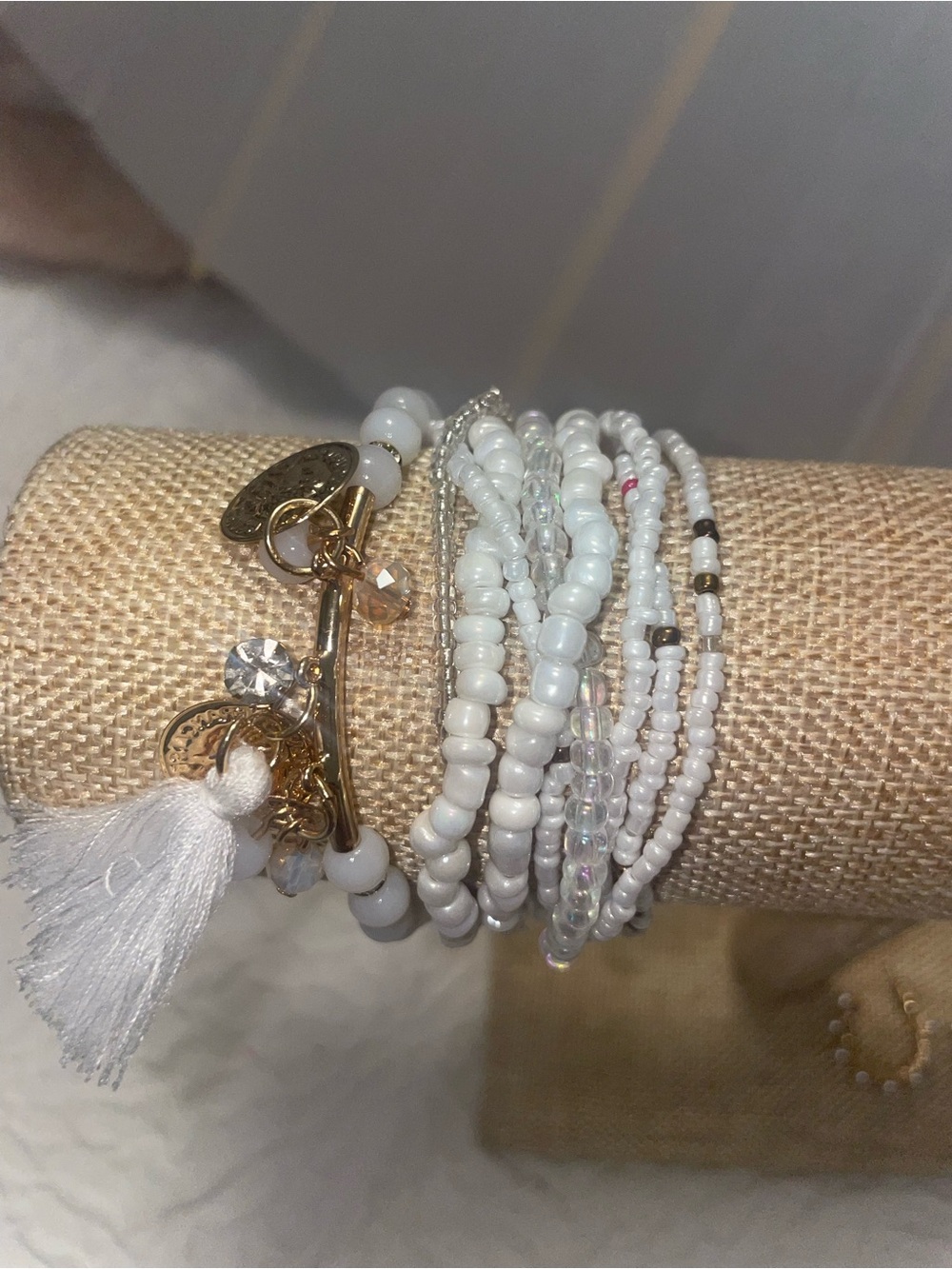White Beaded Multi-Strand Bracelet Stack with Gold Accents